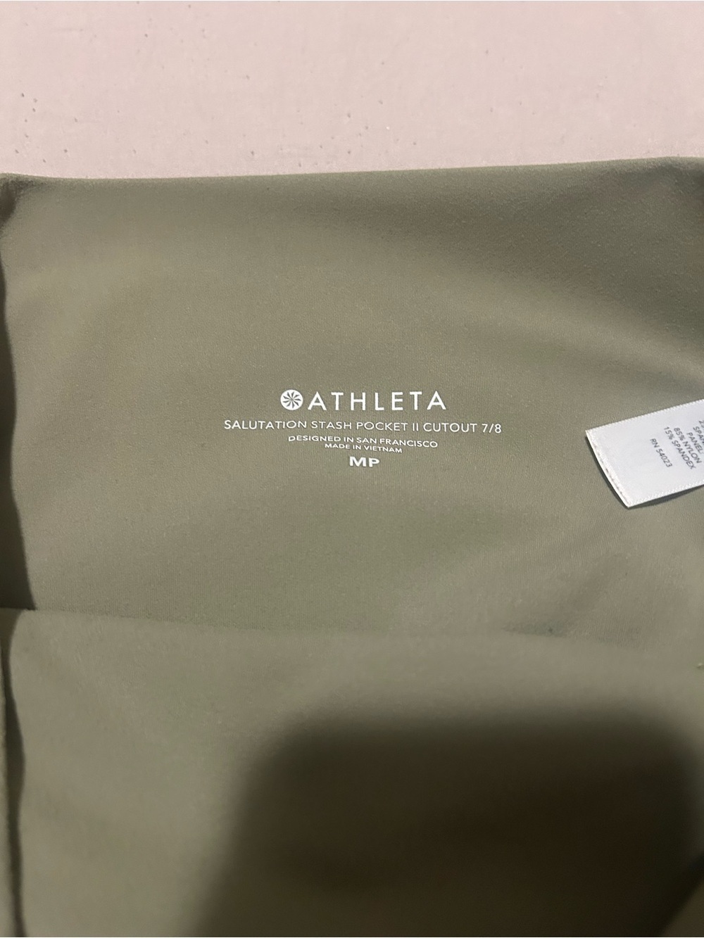 Athleta Olive Green Cropped Leggings with Side Cutout Detail - Picture 9 of 10